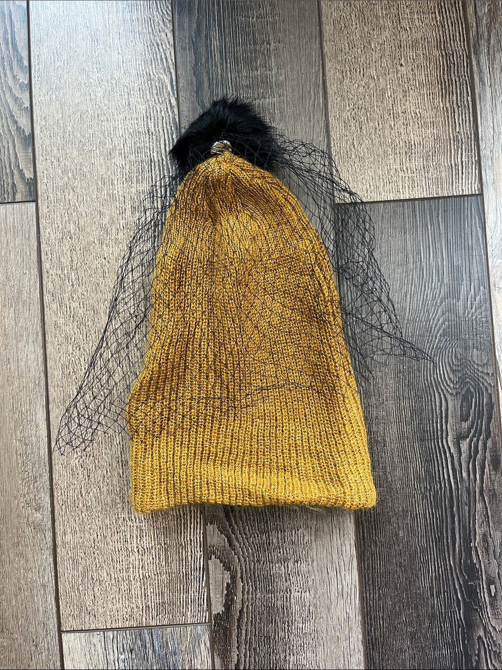 Veiled Knit Beanie in Mustard Yellow with Black Faux Fur Pom